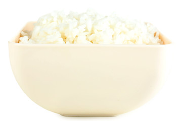 Cooked rice in bowl isolated on white
