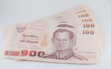 Thai Bath currency with bank note on white background