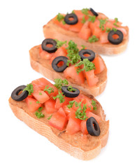 Delicious bruschetta with tomatoes isolated on white