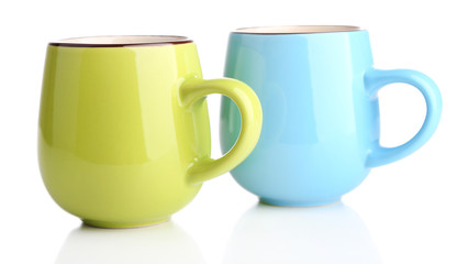 Colorful cups isolated on white