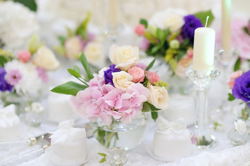 Beautiful pink roses in small vases