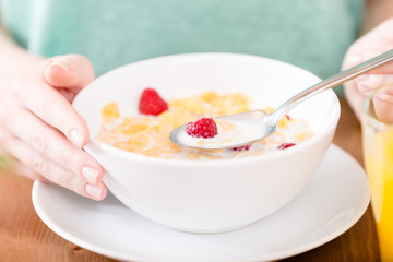 Close up of plate with muesli and strawberry 