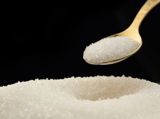 White sugar and spoon