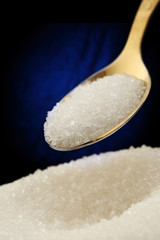 White sugar and spoon