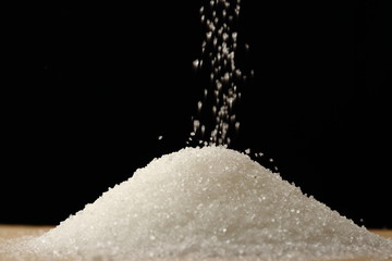 Flow of white sugar