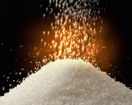 Flow of white sugar