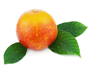 Blood orange with green leaves isolated on white background.