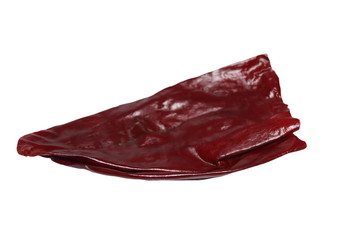 two pressed dried red pepper  isolated on white