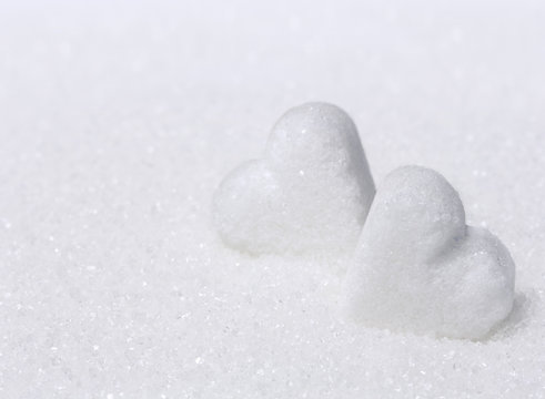 two sweet sugar hearts close-up