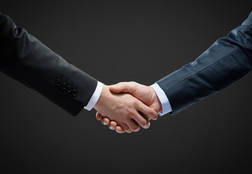 Close up shot of handshake of business people