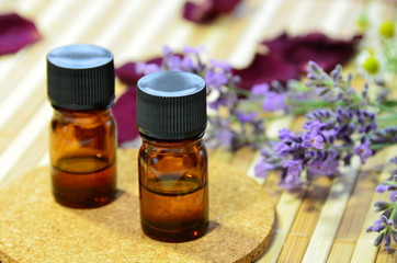 Obraz na płótnie Canvas essential oils with lavender