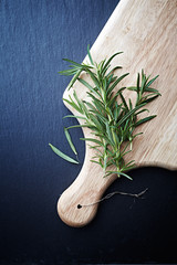 Fresh Rosemary on a Kitchen Board