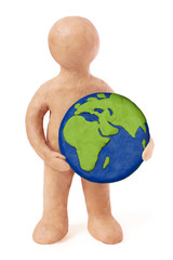 Plasticine man holding earth