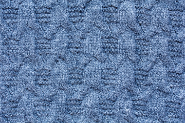 Fototapeta na wymiar Closeup of knitted wool pattern as a background
