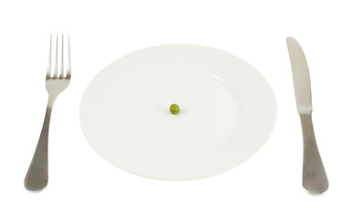 Plate with a single green pea isolated