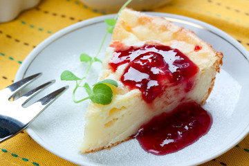 piece of cheesecake with jam