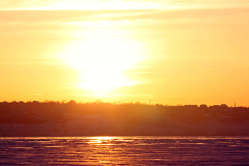Fototapeta na wymiar view on riverside at sunset