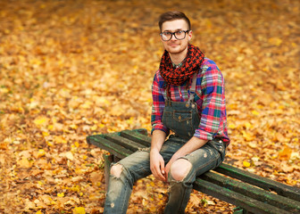 Young hipster relaxed man in nature