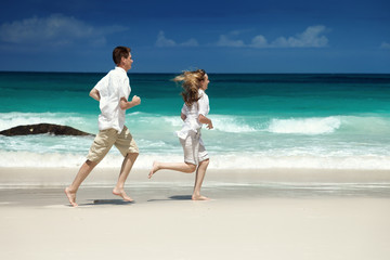 man and woman romantic couple on tropical beach