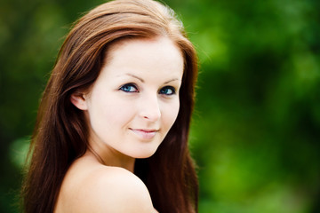 Beautiful Blue Eyed Woman. Beauty Portrait. Green Background.