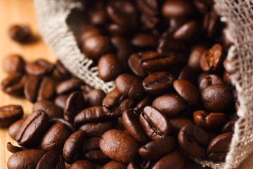 Roasted coffee beans in linen bag