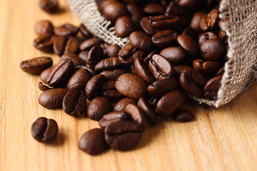 Roasted coffee beans in linen bag