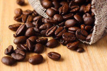 Roasted coffee beans in linen bag