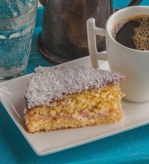 Portion biscuit, coffee cup and coffee pot