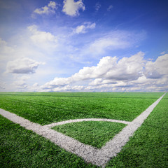 Corner of a soccer field and blue sky