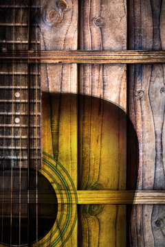 acoustic guitar on wooden wall background