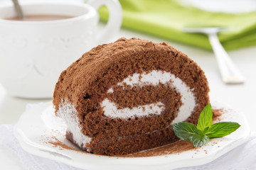 Chocolate roll with cream.