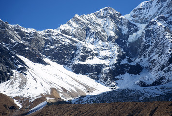 High rocky mountains, snow-capped peaks