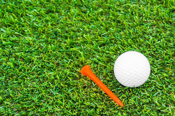 Close up of golf ball and tee