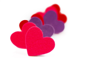 Many colored heart shapes in a row