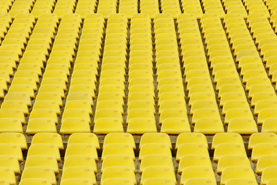 Yellow seat in sport stadium