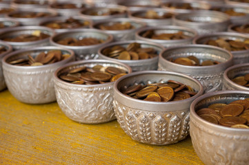 Coin in bowl