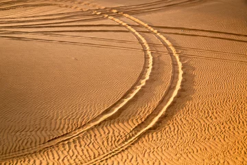  Car track in the desert © sergemi