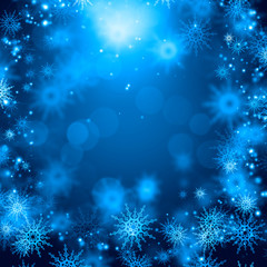 Fototapeta na wymiar Snowflakes on blue