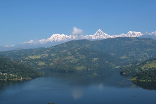 Beautiful lake Begnas Tal and snow capped Annapurna Range