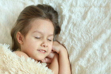 Beautiful little girl is sleeping