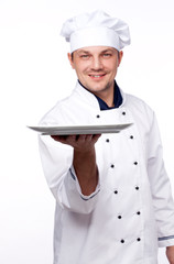 chef holding empty plate