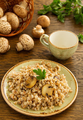 Buckwheat porridge with mushrooms on plate