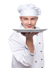 chef holding empty plate