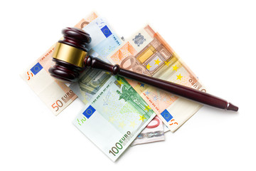 judge gavel on euro bills
