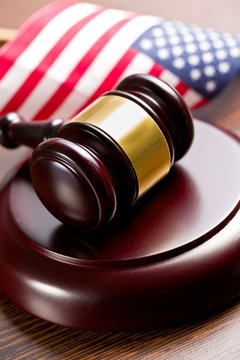judge gavel with american flag