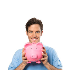Junger Mann mit Sparschwein