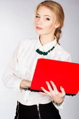 Portrait of  business woman with a laptop