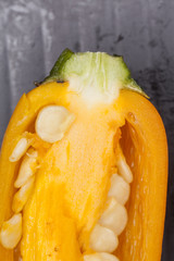 cut chili, close-up of cut yellow chili showing core and seeds