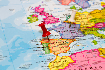 Map of Spain with a white pushpin stuck