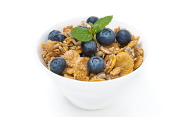 delicious muesli with fresh blueberries and mint, isolated